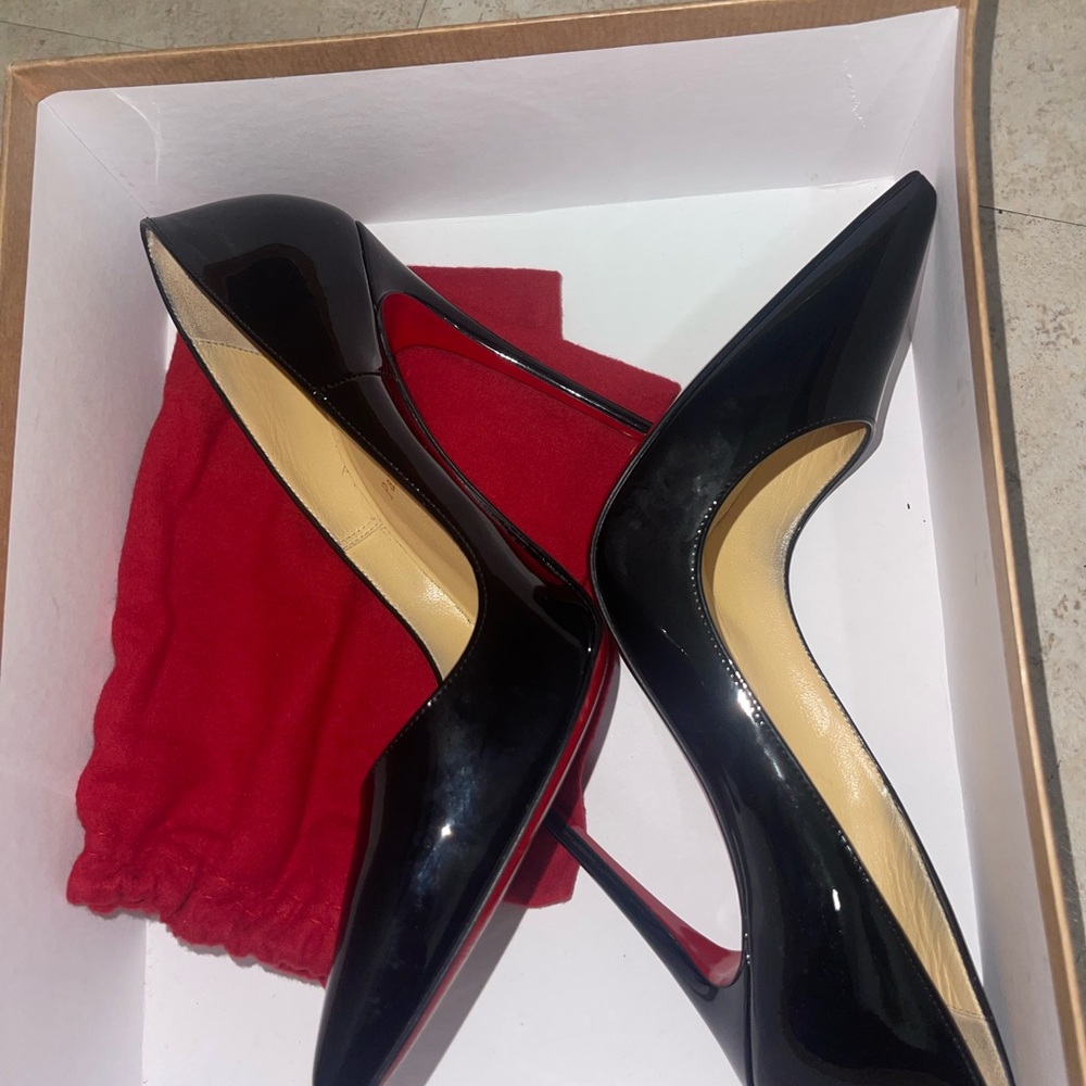 Christian Louboutin
So Kate Patent Pointed-Toe Red Sole Pump